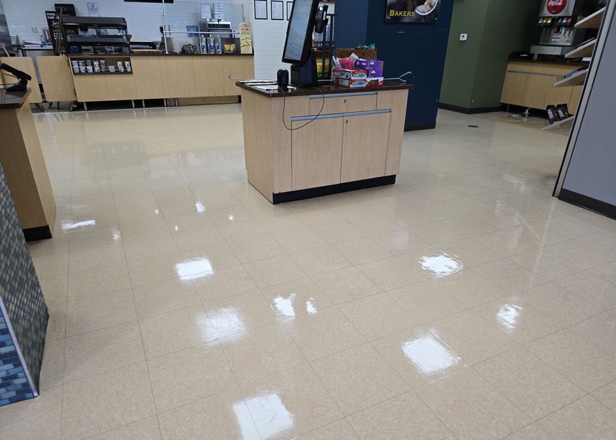 A cafe and checkout floor with a high gloss finish